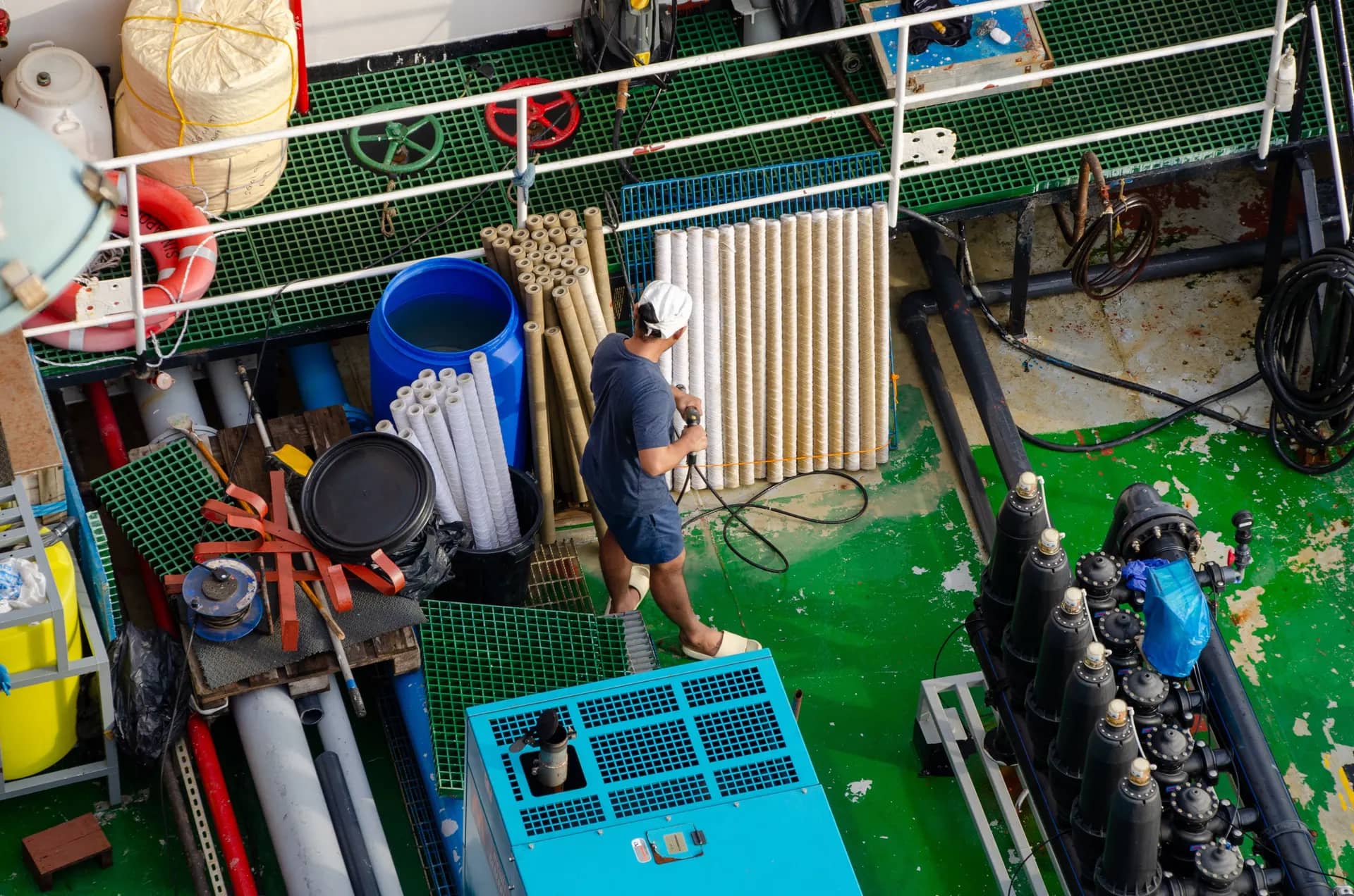 Pool plant room with filter vessels, pipework and equipment seen from above
